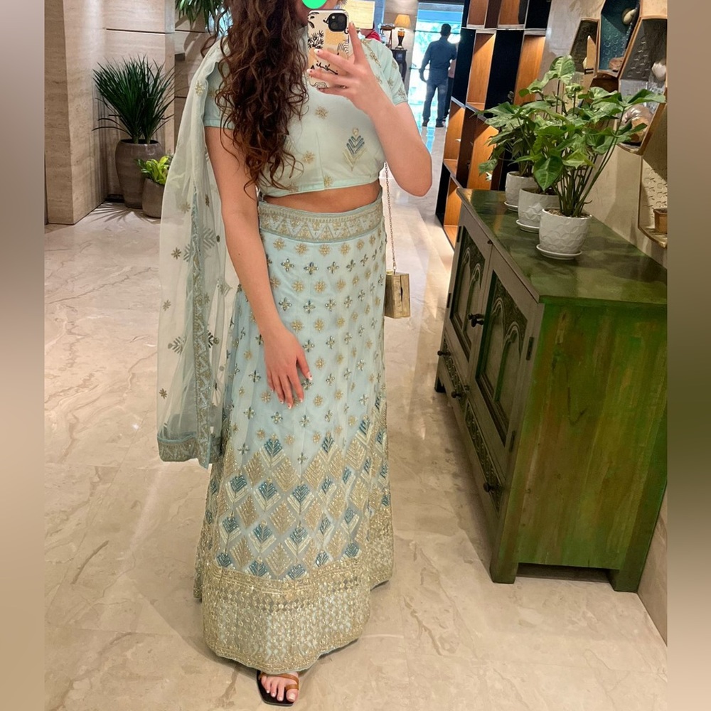 Authentic Lehenga in Light Blue color with Gold embroidery